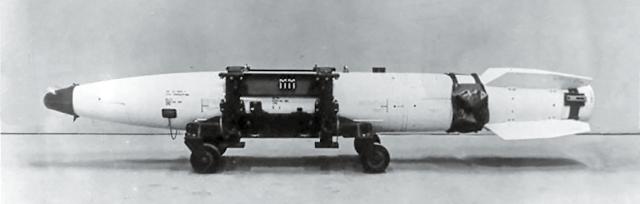 Profile view of a B43 nuclear bomb on a transport cart